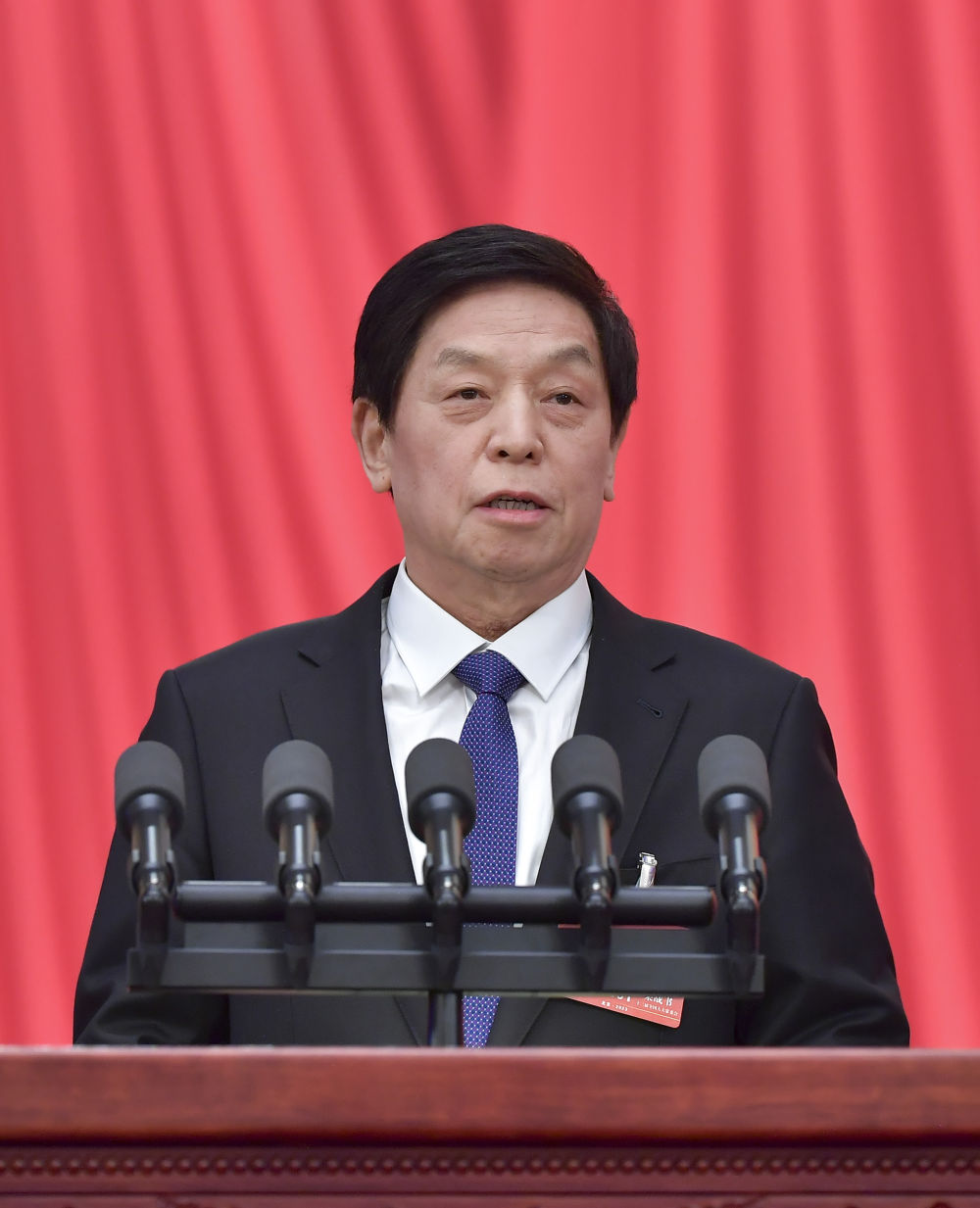 3月7日,十四届全国人大一次会议在北京人民大会堂举行第二次全体会议。受十三届全国人大常委会委托,栗战书委员长向大会报告全国人大常委会工作。新华社记者 李涛 摄