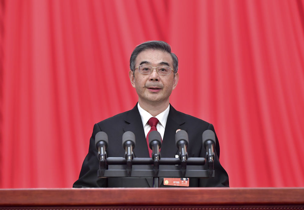 3月7日,十四届全国人大一次会议在北京人民大会堂举行第二次全体会议。最高人民法院院长周强作最高人民法院工作报告。新华社记者 李涛 摄